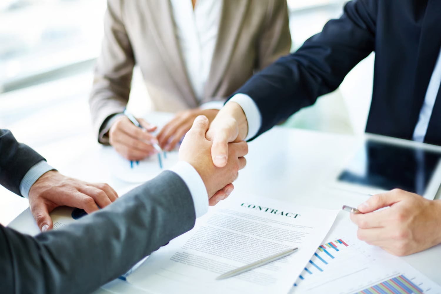 Trustees handshake representing partnership